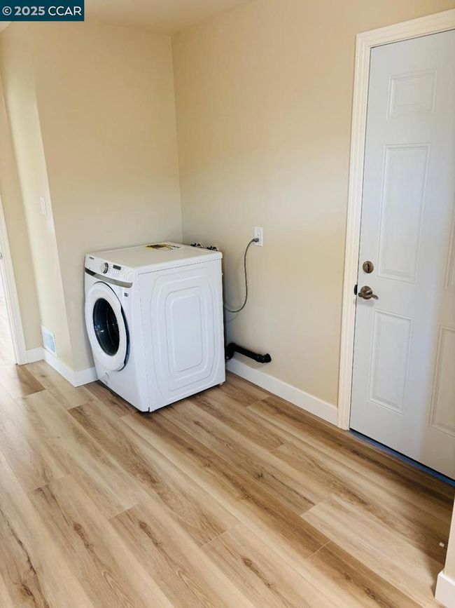 Laundry Room & Interior Garage Access | Image 12