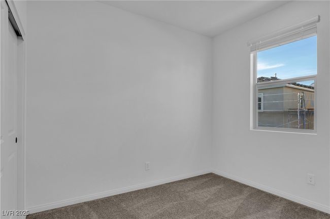 Carpeted empty room with baseboards | Image 13