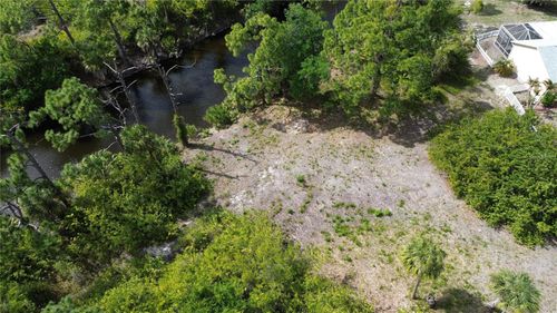 7711 Cosmo Ct, PORT CHARLOTTE, FL, 33981-6427 | Card Image