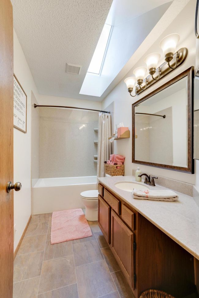 11672 Flintwood St Nw, House other with 5 bedrooms, 4 bathrooms and null parking in Coon Rapids MN | Image 25