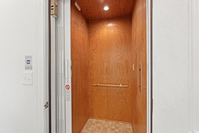 Elevator with wood walls | Image 30