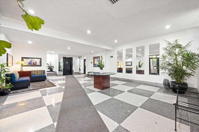 Common area with recessed lighting and a textured ceiling | Image 23