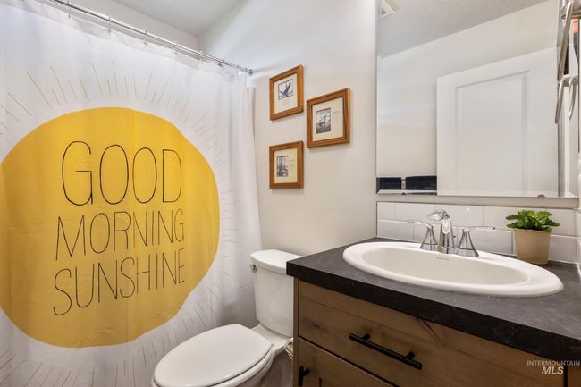 Full bath featuring vanity and a shower with shower curtain | Image 20