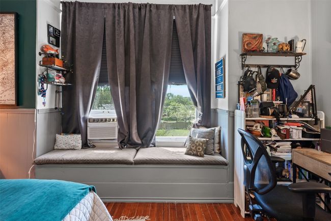 Bedroom with a wainscoted wall, hardwood / wood-style floors, and cooling unit | Image 22