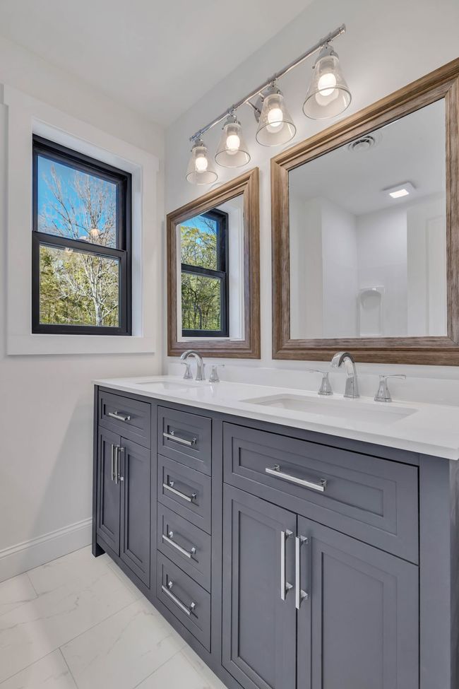 Upstairs bathroom with double vanity. | Image 34