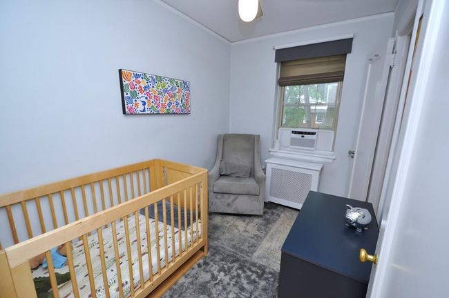 Third Bedroom has a renovated private bath with step in shower and can be used as a nursery, aupair room, office or den. | Image 26