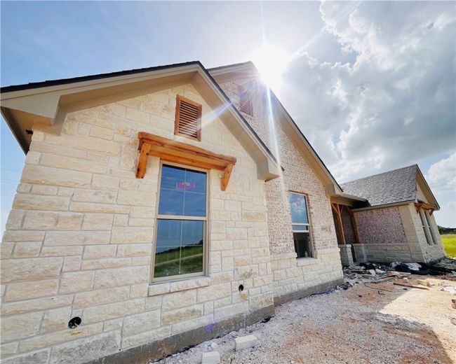 View of side of property featuring stone siding | Image 10