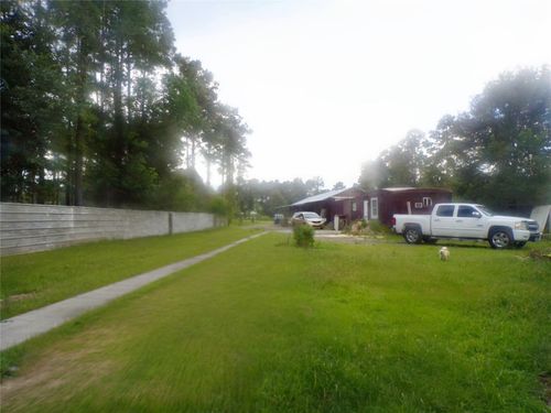 1590 County Road 5003, Cleveland, TX, 77327-3111 | Card Image