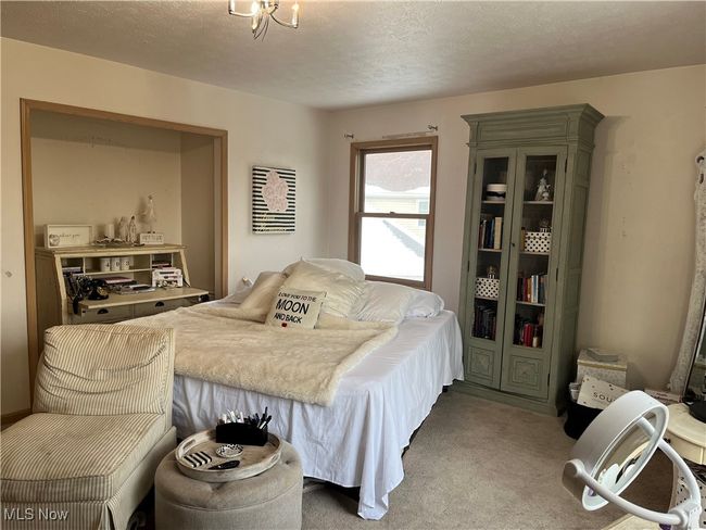 Upstairs featuring a textured ceiling | Image 29