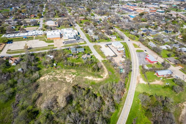 Aerial overview of property's location with nearby suburban area | Image 6