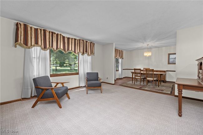 Living room with large window to view of backyard | Image 8