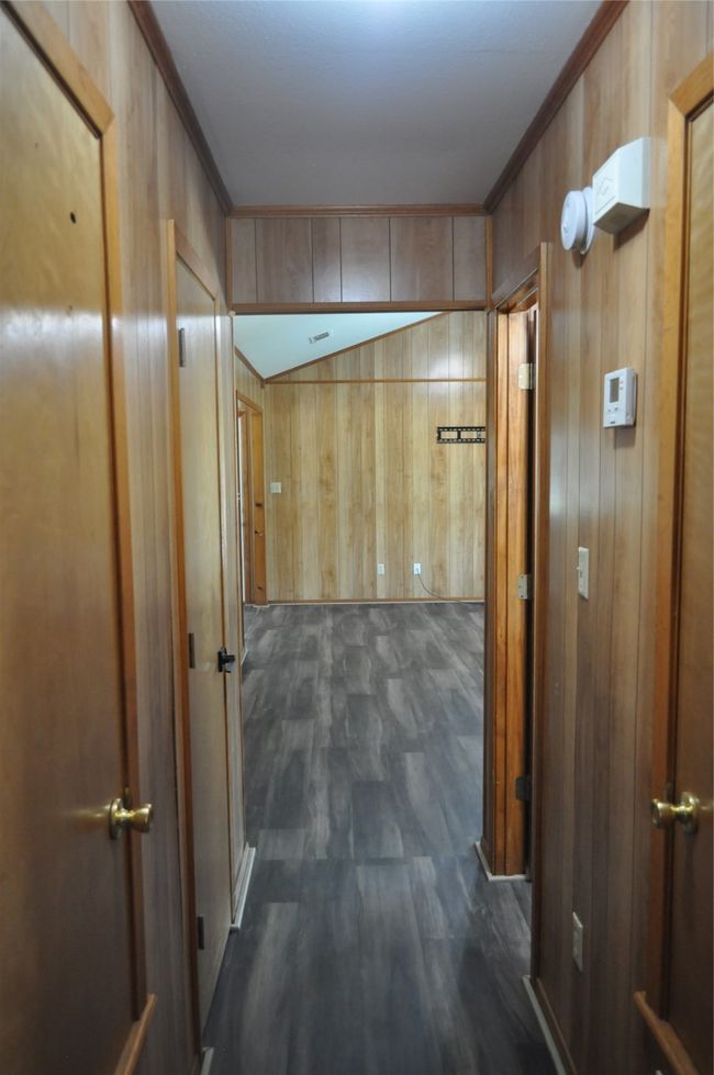Hallway looking into living room | Image 8