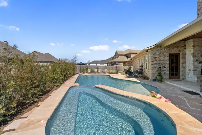 The beautiful, inviting, relaxing resort-style backyard features aheated and lighted Gunite pool with a huge separate spa. | Image 41