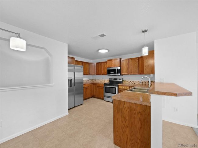 UNIT-307 - 10818 Cimarron St, House attached with 2 bedrooms, 2 bathrooms and null parking in Firestone CO | Image 7