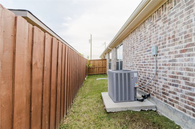 View of yard featuring central air condition unit | Image 22