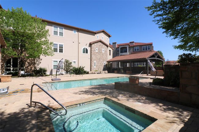 Community pool featuring a patio area, a gazebo, and a hot tub | Image 31