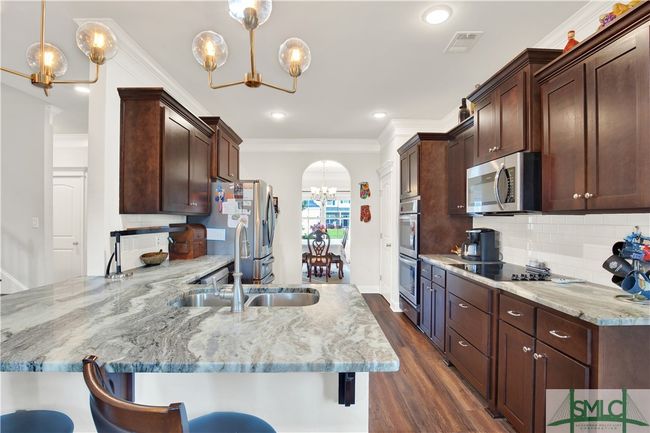 Snack bar/breakfast bar in the kitchen | Image 13