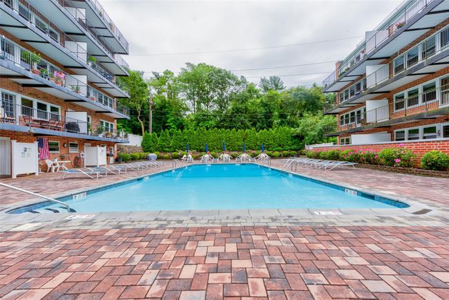 Pool featuring a patio area | Image 26