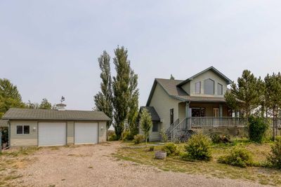 225046 Range Road 282, House detached with 4 bedrooms, 2 bathrooms and 10 parking in Rocky View County AB | Image 1