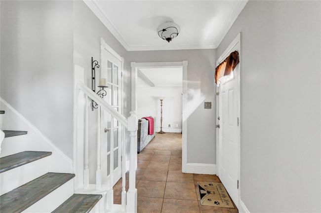 Front entrance looking into living room. | Image 10