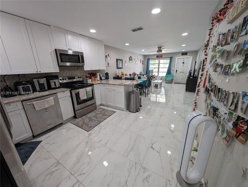 12-7761 Nw 42nd Pl, Coral Springs, FL, 33065-1945 | Card Image