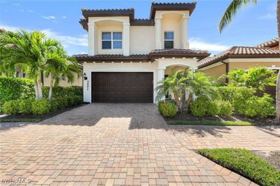 Mediterranean / spanish house with a garage | Image 3