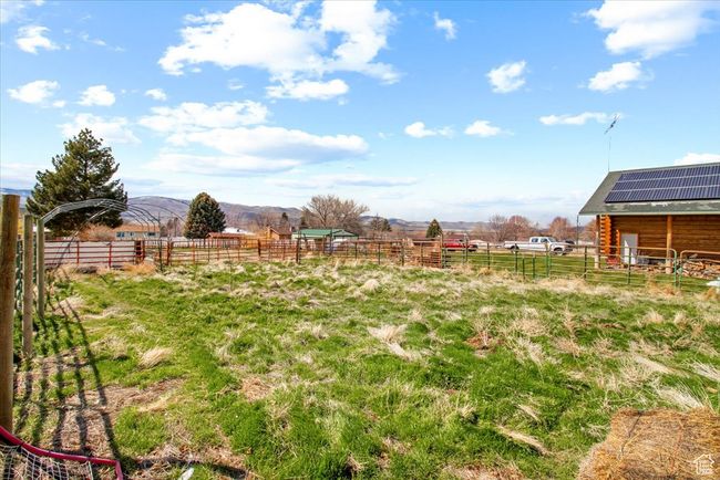 View of yard featuring a mountain view and a rural view | Image 19