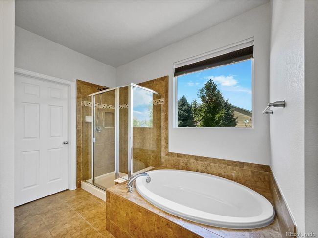 5864 Quarry St, House other with 3 bedrooms, 3 bathrooms and 2 parking in Timnath CO | Image 36