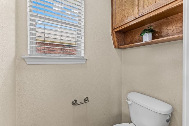 Bathroom featuring toilet | Image 12