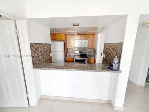 e211-6995 Nw 186th St, Hialeah, FL, 33015-3443 | Card Image