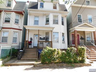 97 Oraton Street, Home with 7 bedrooms, 3 bathrooms and null parking in Newark NJ | Image 1