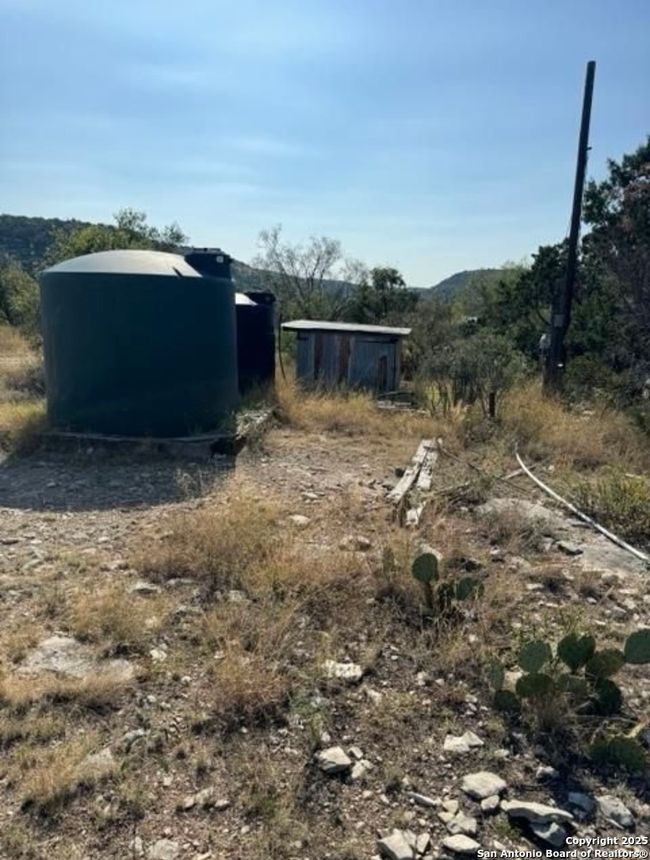 Shared area with well and electricity. | Image 36