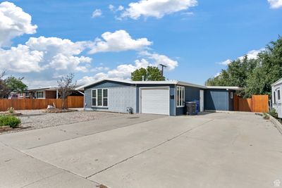 View of front of house featuring a garage | Image 2