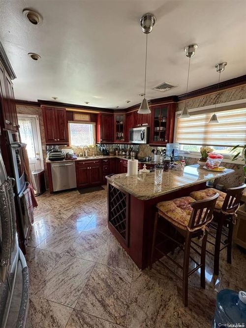 830 Pepperidge Rd, Westbury, NY, 11590-1423 | Card Image