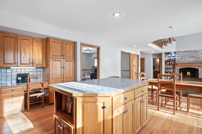 Fill the large pantry with all of your snacks, pantry staples, and your kitchen essentials. The desk nook offers a small office space, coffee bar, wine bar, or electronics charging station space. Find a use that best suites your lifestyle. | Image 12