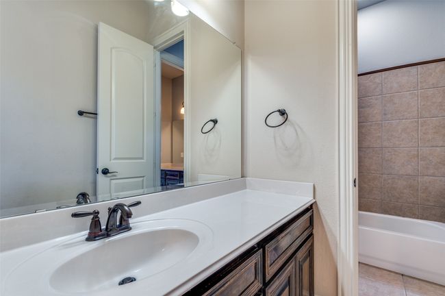 Bathroom featuring vanity and tile patterned flooring | Image 32