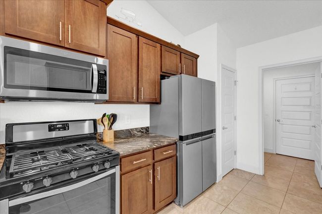 9750 Pepper Tree Pl, House other with 4 bedrooms, 2 bathrooms and null parking in WILDWOOD FL | Image 17