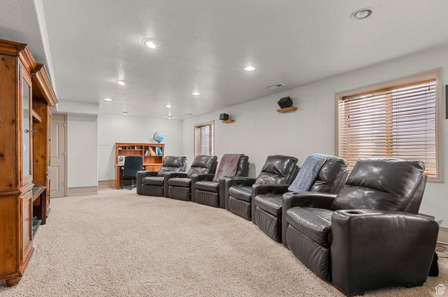 Carpeted family room featuring recessed lighting and baseboards | Image 20