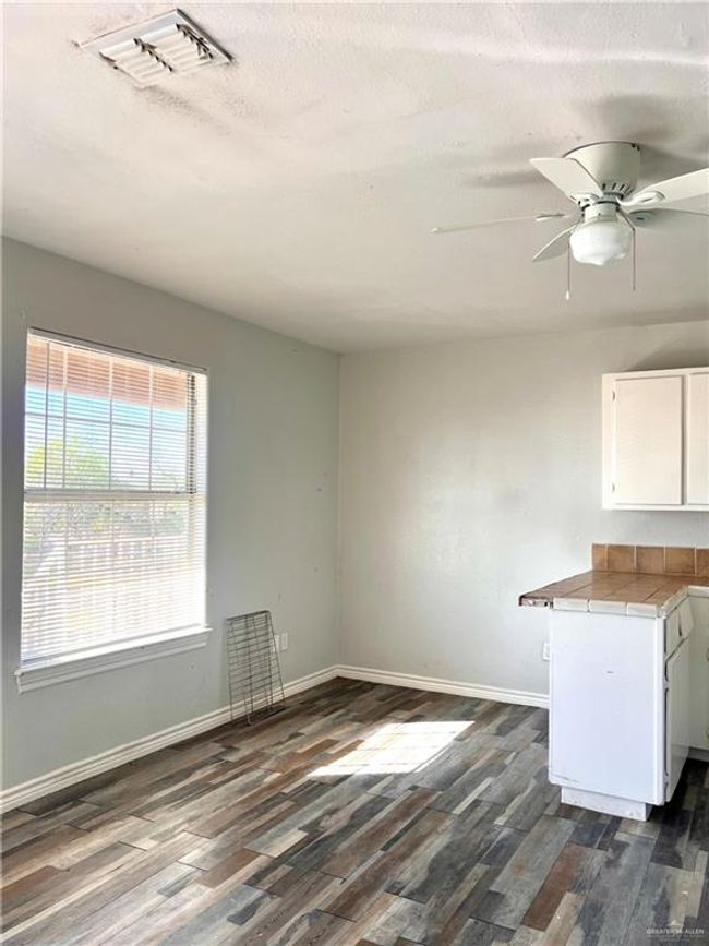 Dining area by kitchen | Image 8