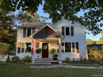 13817 Division Street, Home with 3 bedrooms, 1 bathrooms and null parking in Charlevoix MI | Image 1