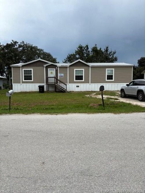 409 Oakmont Ave Nw, Moore Haven, FL, 33471-2628 | Card Image