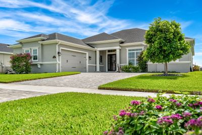 8481 Paragrass Avenue, House other with 4 bedrooms, 3 bathrooms and null parking in Melbourne FL | Image 1