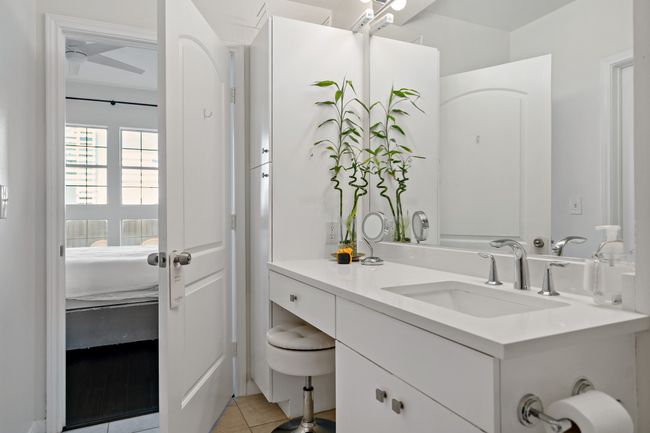 Ensuite bathroom featuring connected bathroom, tile patterned flooring, and vanity | Image 19