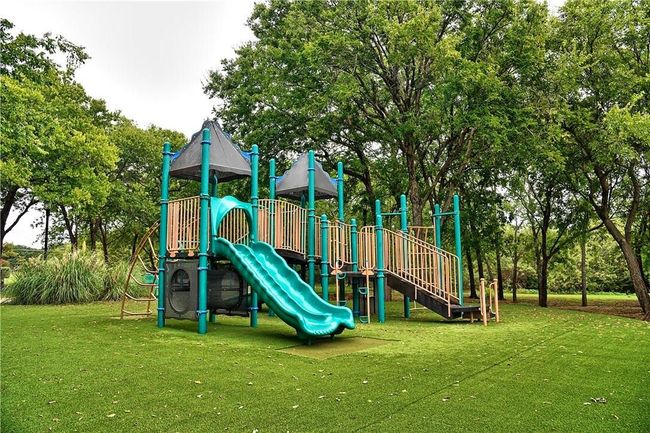 Community play area featuring a lawn | Image 27