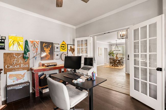 Another perspective of the front office framed by stylish French doors | Image 5