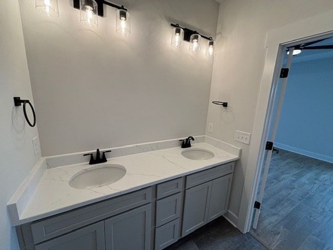 Spacious primary bathroom with double vanties!! | Image 24