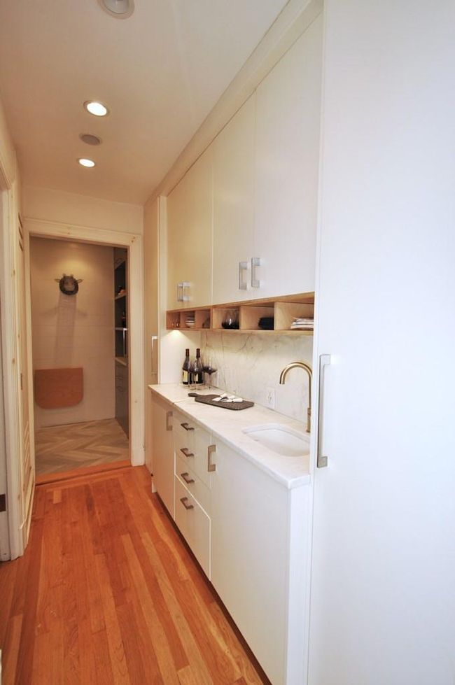 Butler Pantry has a working sink and hidden wine cooler. The Butler panty is between the Kitchen and dining room. | Image 14