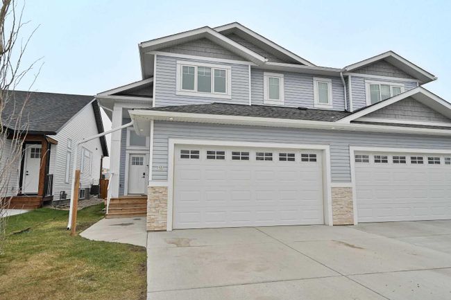 39 Violet Close, Home with 4 bedrooms, 3 bathrooms and 2 parking in Olds AB | Image 1