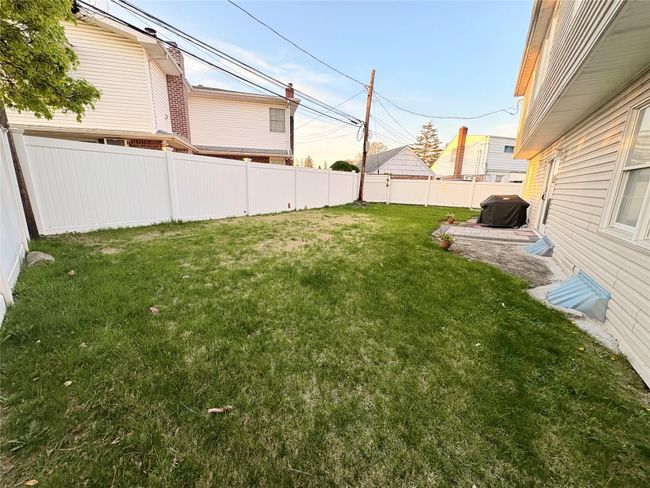 View of yard featuring a fenced backyard | Image 5