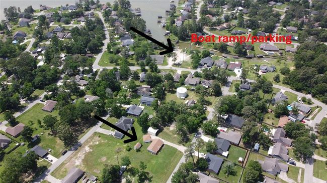 Near boat ramp and neighborhood fishing pier, pool, park, and community pavilion! Property has never had issues with flooding since 1975! | Image 32